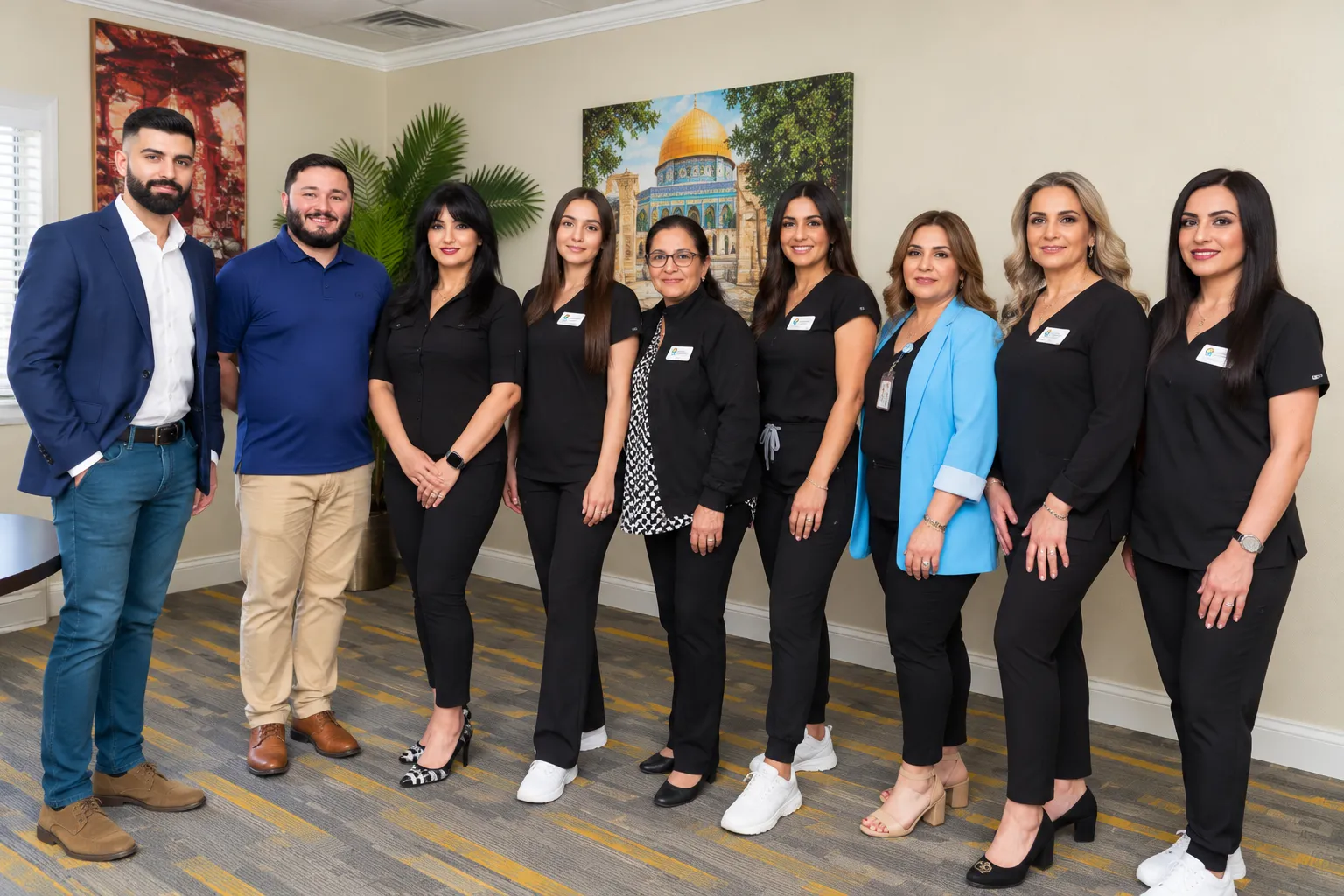 Palm Mental Health team photograph. Palm Mental Health team of nine people standing together at the El Cajon office.