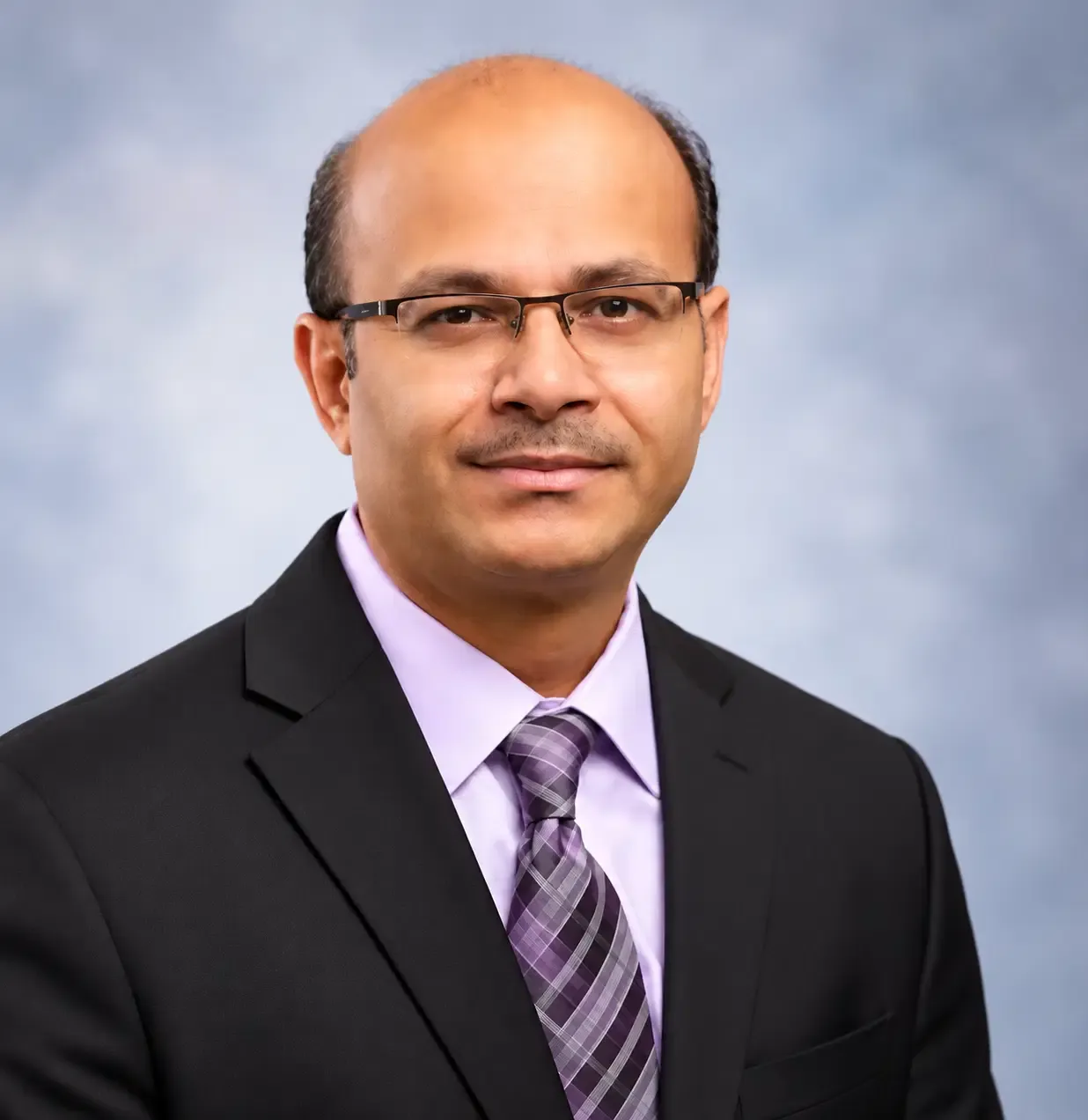 Portrait of Kalpesh B. Bhavsar, Board-Certified Psychiatrist | Supervising Physician for Psychiatric Nurse Practitioners